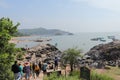 Tourists walking towards Om Beach at Gokarna - Arabian sea - Indian beach holiday